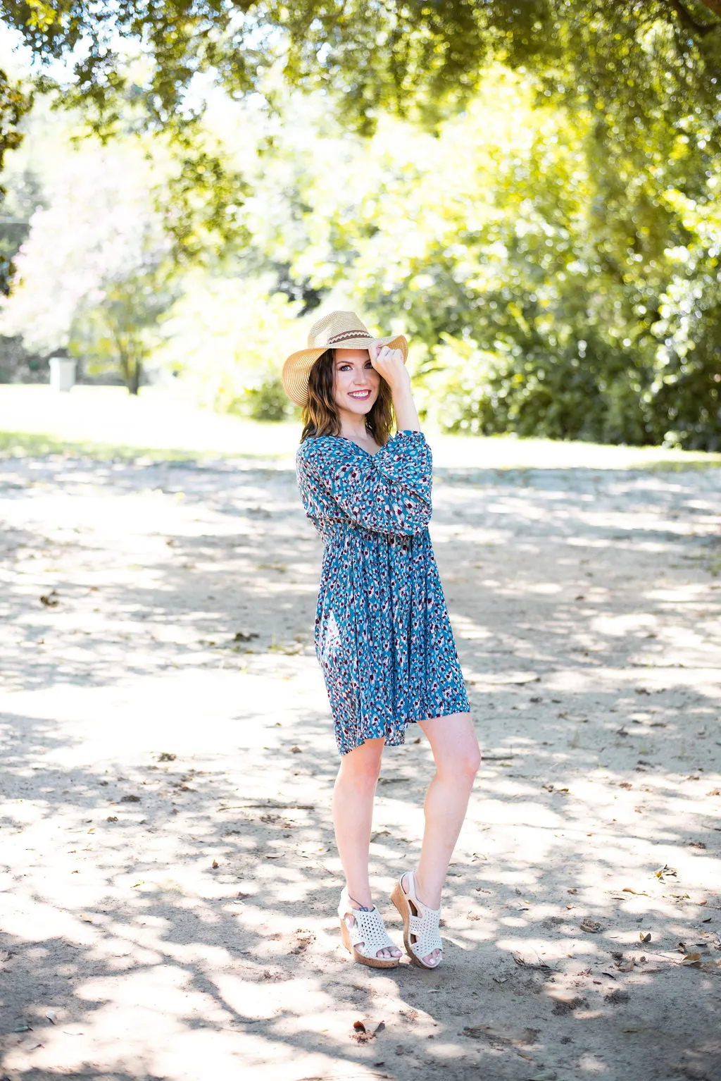 Long Sleeve Animal Print Babydoll Dress by Umgee Clothing